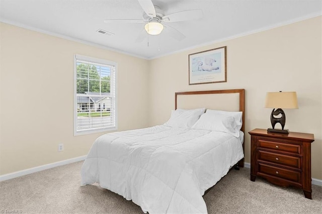 6796 Ironwood Cir, Greensboro, NC 27410 - bedroom featuring carpet floors, crown molding, baseboards, and a ceiling fan