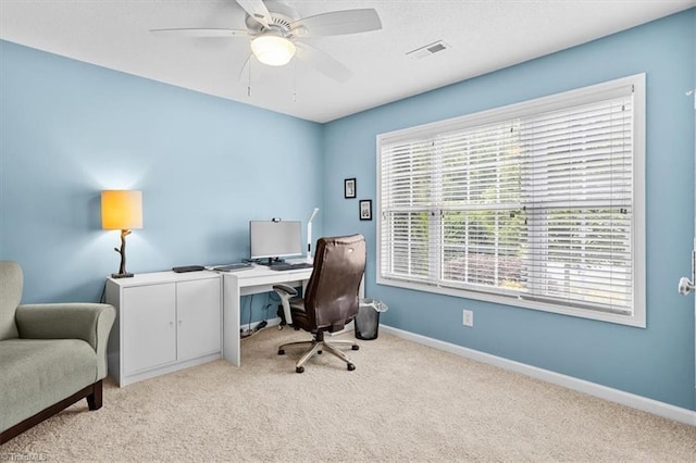 6796 Ironwood Cir, Greensboro, NC 27410 - office area featuring carpet, ceiling fan, and baseboards