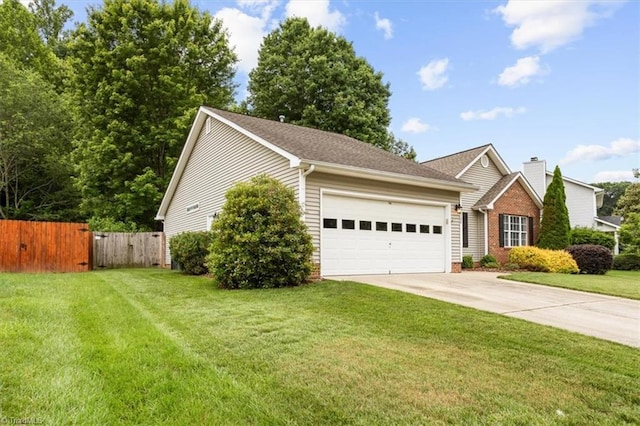 6796 Ironwood Cir, Greensboro, NC 27410 - view of front facade featuring a garage, driveway, and brick siding