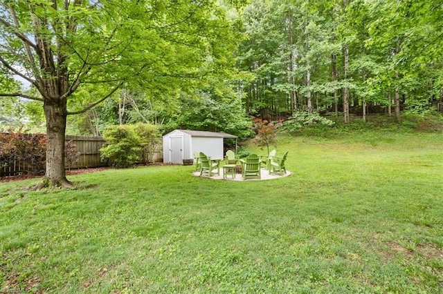 6796 Ironwood Cir, Greensboro, NC 27410 - view of yard with an outdoor fire pit