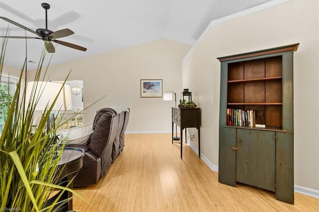 6796 Ironwood Cir, Greensboro, NC 27410 - office featuring light wood-style flooring, ceiling fan, lofted ceiling, and baseboards