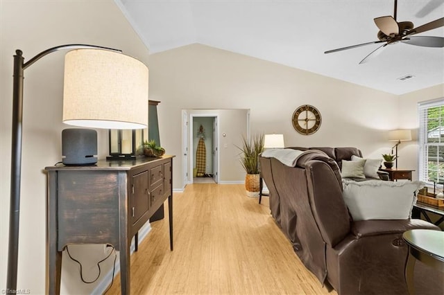 6796 Ironwood Cir, Greensboro, NC 27410 - bedroom featuring vaulted ceiling, light wood-style floors, and baseboards