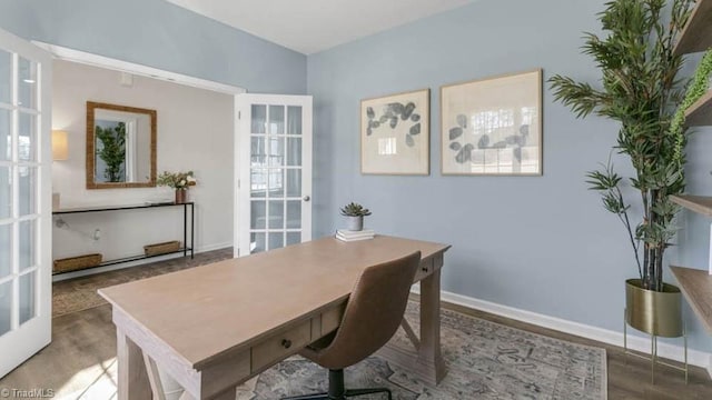 office featuring french doors, baseboards, and wood finished floors