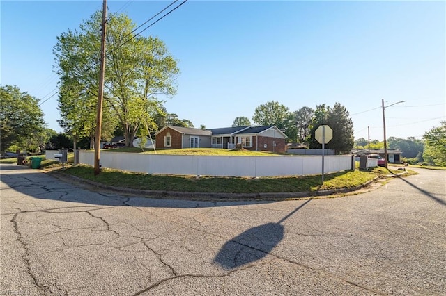 3227 Loftyview Dr, High Point, NC 27260 - view of street featuring street lighting, traffic signs, and curbs