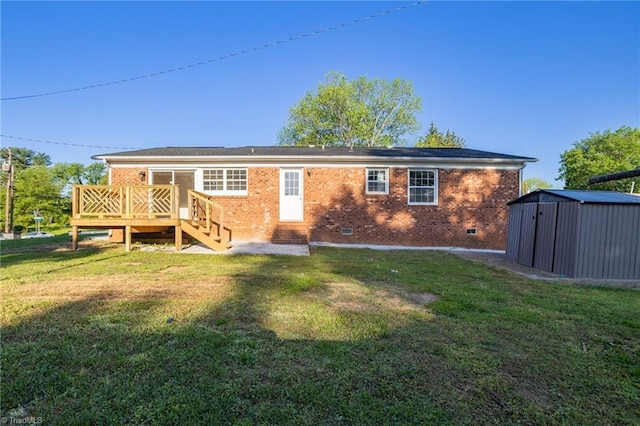 3227 Loftyview Dr, High Point, NC 27260 - rear view of property with a storage unit, brick siding, crawl space, an outbuilding, and a lawn
