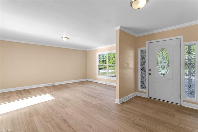 3227 Loftyview Dr, High Point, NC 27260 - foyer with crown molding, baseboards, light wood-type flooring, and visible vents