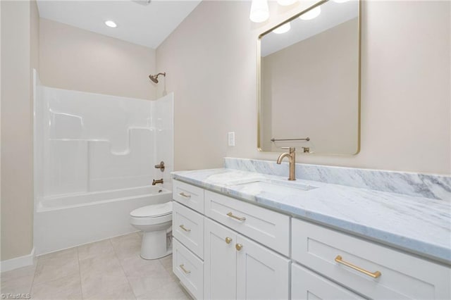 bathroom with tile patterned flooring, vanity, shower / tub combination, and toilet