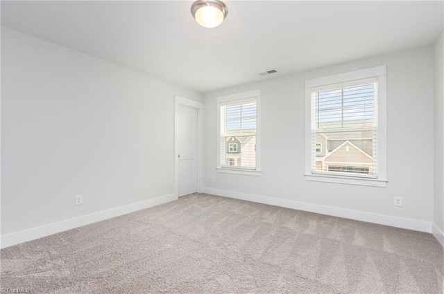 1515 Peabody Ct, Mebane, NC 27302 - empty room featuring baseboards and light carpet