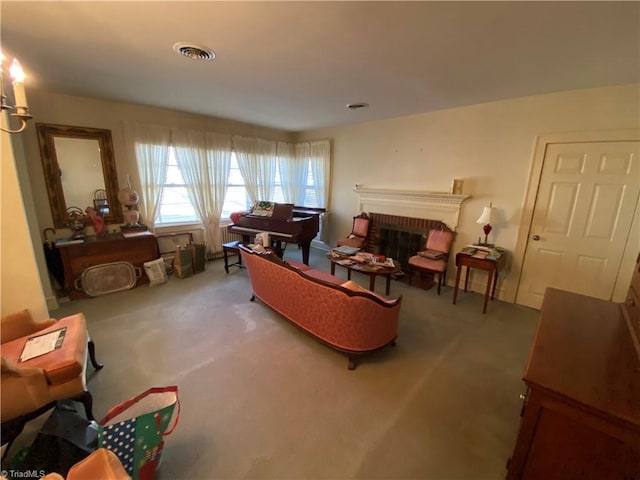 living room with carpet flooring and a fireplace