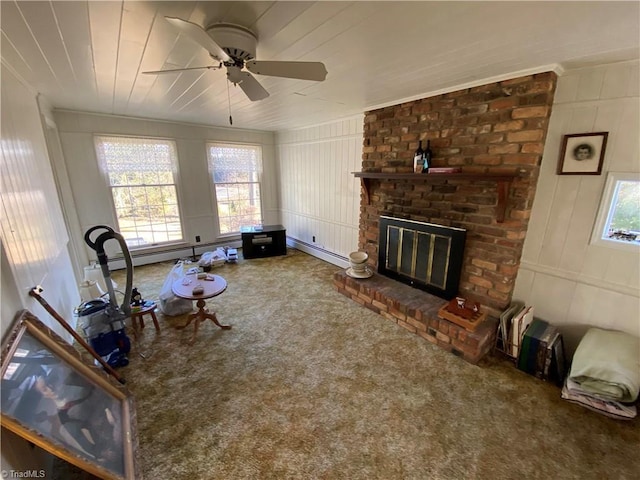 living room featuring carpet floors, a fireplace, a wealth of natural light, and wooden ceiling