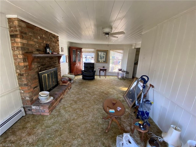 living room with wood ceiling, ceiling fan, carpet flooring, a fireplace, and a baseboard radiator