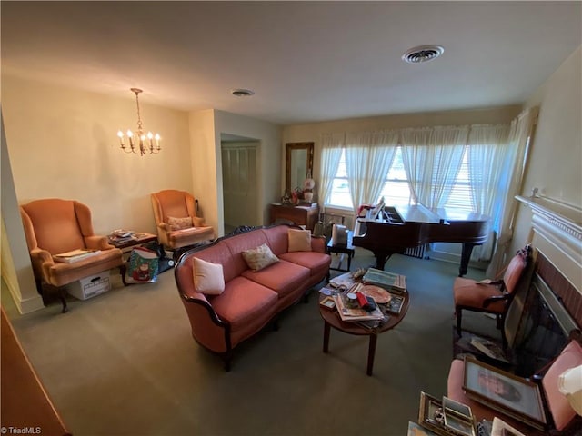 living room with an inviting chandelier and carpet flooring