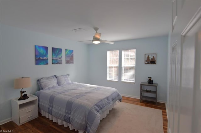 bedroom featuring ceiling fan and wood-type flooring