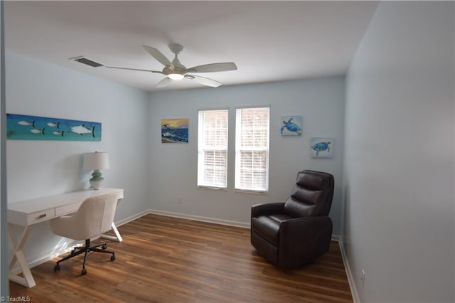 office featuring dark wood-type flooring and ceiling fan