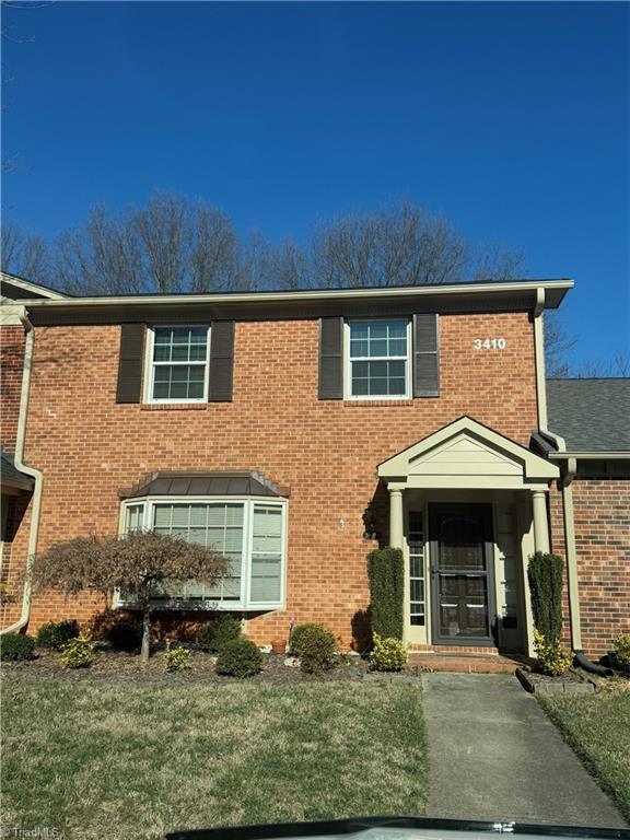 view of front of home with a front yard