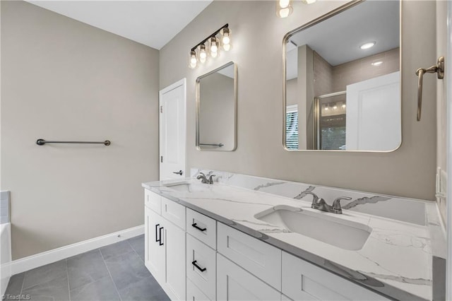 1333 Union Cross Rd, Kernersville, NC 27284 - bathroom featuring baseboards, a shower stall, double vanity, and tile patterned flooring