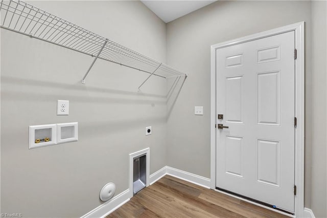 1333 Union Cross Rd, Kernersville, NC 27284 - laundry area with baseboards, electric dryer hookup, wood finished floors, and washer hookup