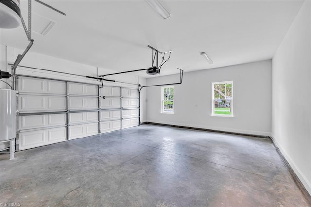 1333 Union Cross Rd, Kernersville, NC 27284 - garage featuring a garage door opener, baseboards, and water heater