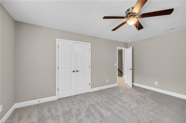 1333 Union Cross Rd, Kernersville, NC 27284 - unfurnished bedroom with carpet floors, baseboards, a closet, and ceiling fan