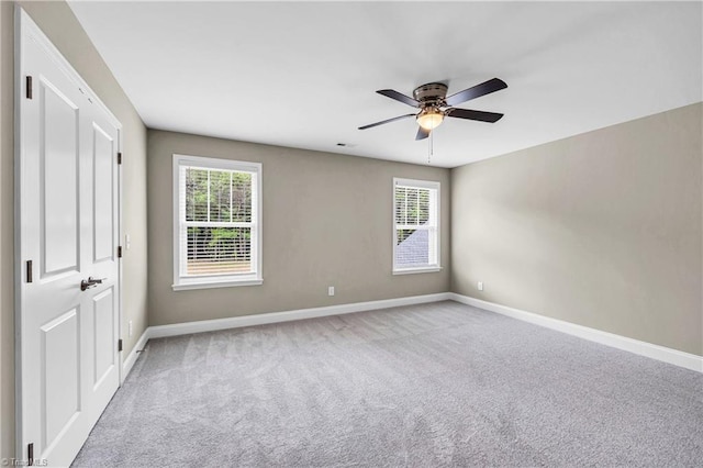 1333 Union Cross Rd, Kernersville, NC 27284 - unfurnished bedroom featuring multiple windows, baseboards, and carpet flooring