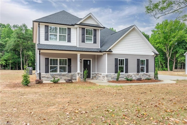 1333 Union Cross Rd, Kernersville, NC 27284 - craftsman house featuring stone siding, a porch, and a shingled roof