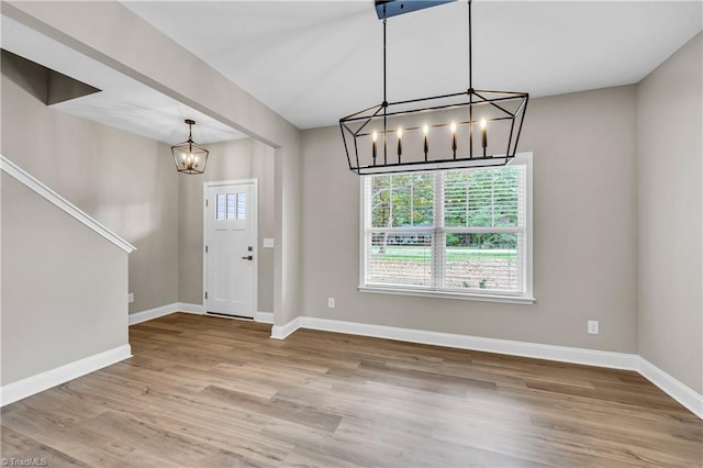 1333 Union Cross Rd, Kernersville, NC 27284 - entryway with a chandelier, wood finished floors, and baseboards