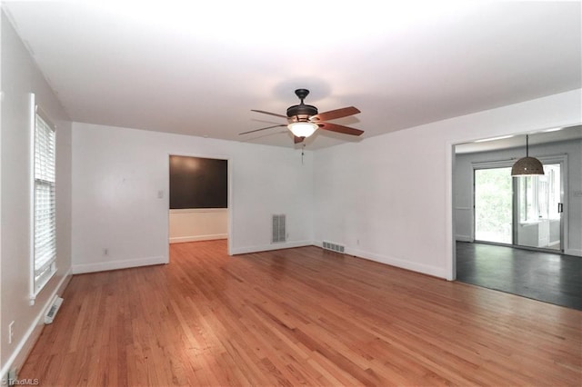 interior space with ceiling fan and light hardwood / wood-style floors