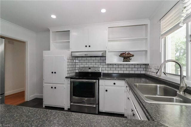 kitchen with stainless steel electric range oven, white cabinetry, sink, decorative backsplash, and ornamental molding