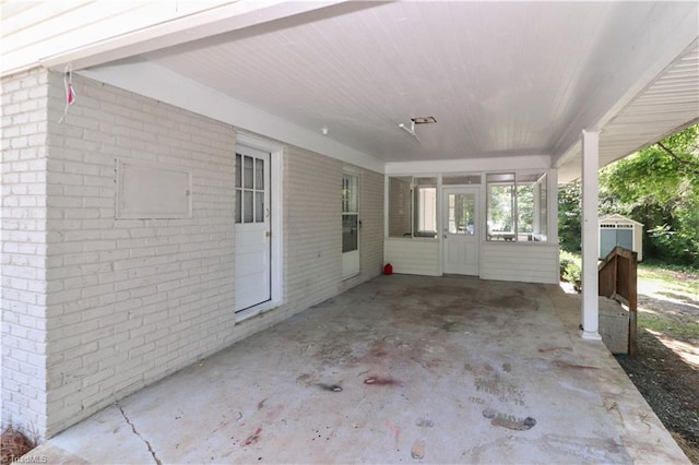 view of patio / terrace with a storage unit