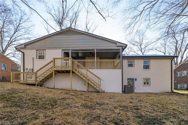 rear view of property featuring central air condition unit