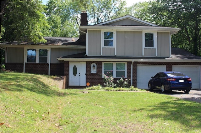 split level home with a chimney, board and batten siding, and a front yard