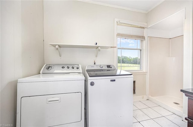 306 Pratt Rd, Dobson, NC 27017 - washroom featuring independent washer and dryer, light tile patterned flooring, and ornamental molding
