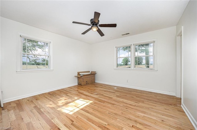 306 Pratt Rd, Dobson, NC 27017 - unfurnished room with light wood-type flooring and ceiling fan