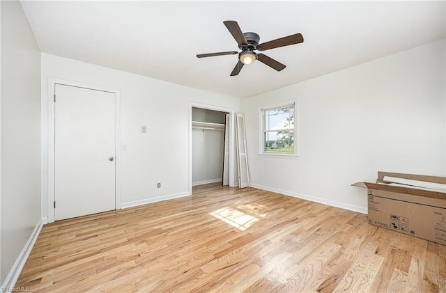 306 Pratt Rd, Dobson, NC 27017 - unfurnished bedroom with light wood-style flooring, a closet, and ceiling fan