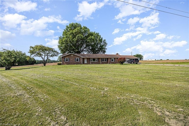 306 Pratt Rd, Dobson, NC 27017 - ranch-style house featuring a front yard and a view of countryside