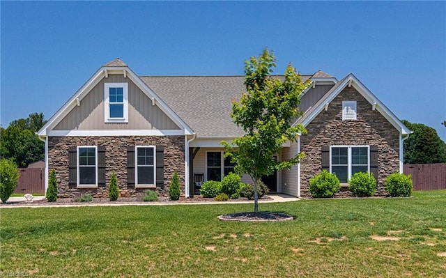 3609 Wesley Point Dr, Browns Summit, NC 27214 - craftsman-style home featuring stone siding, board and batten siding, and roof with shingles