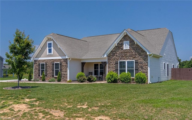 3609 Wesley Point Dr, Browns Summit, NC 27214 - craftsman-style house with stone siding, roof with shingles, and board and batten siding
