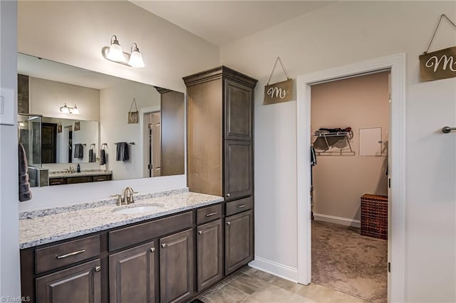 3609 Wesley Point Dr, Browns Summit, NC 27214 - full bathroom featuring vanity and a closet