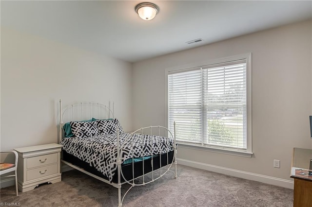 3609 Wesley Point Dr, Browns Summit, NC 27214 - carpeted bedroom with baseboards