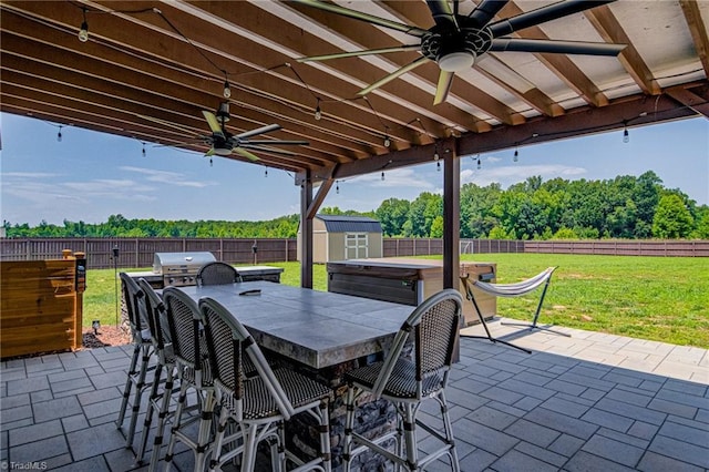 3609 Wesley Point Dr, Browns Summit, NC 27214 - fenced backyard with ceiling fan, a patio, and a shed