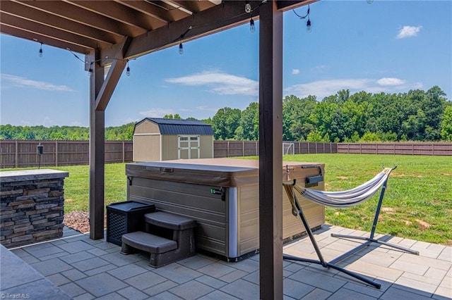 3609 Wesley Point Dr, Browns Summit, NC 27214 - fenced backyard featuring a hot tub, a patio, and a shed