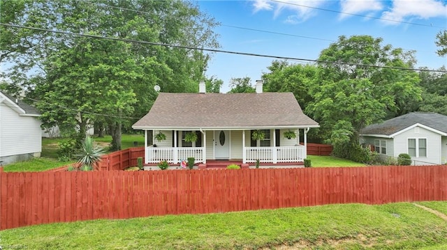 4624 Circle Dr, Winston-Salem, NC 27105 - view of front of home featuring covered porch, roof with shingles, and a chimney
