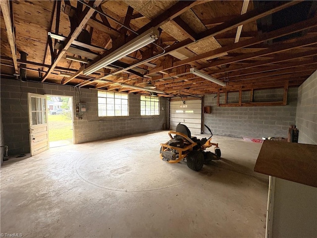 200 N 9th Ave, Mayodan, NC 27027 - garage featuring concrete block wall