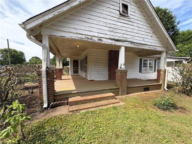 200 N 9th Ave, Mayodan, NC 27027 - rear view of property featuring covered porch