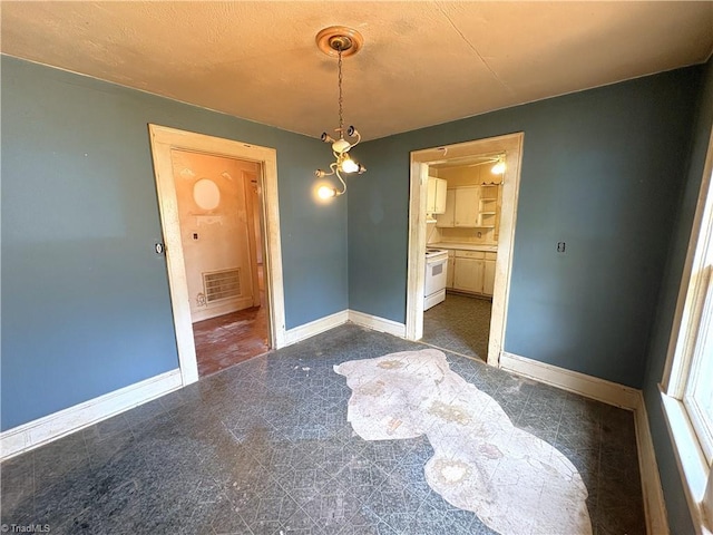 200 N 9th Ave, Mayodan, NC 27027 - unfurnished dining area with baseboards