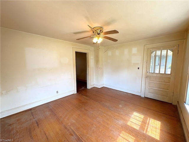 200 N 9th Ave, Mayodan, NC 27027 - empty room featuring a ceiling fan and wood finished floors