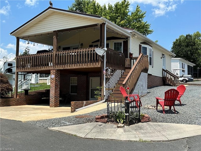 manufactured / mobile home featuring a deck