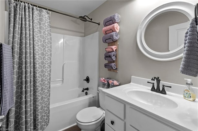 full bathroom with toilet, vanity, and shower / tub combo with curtain