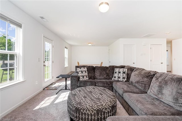 1026 Baileys Chapel Rd, Advance, NC 27006 - living area with carpet floors and baseboards