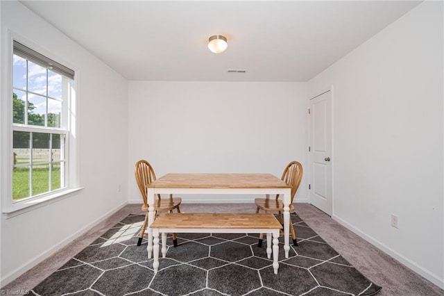 1026 Baileys Chapel Rd, Advance, NC 27006 - carpeted dining room with plenty of natural light